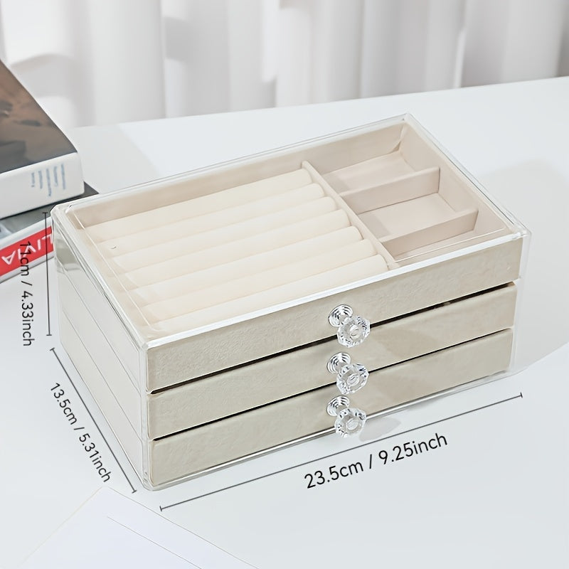 Transparent three-layer portable jewelry storage box with large capacity and dustproof drawers. Perfect for storing earrings, necklaces, and other jewelry. Ideal gift for Valentine's Day, Christmas, or any special occasion.