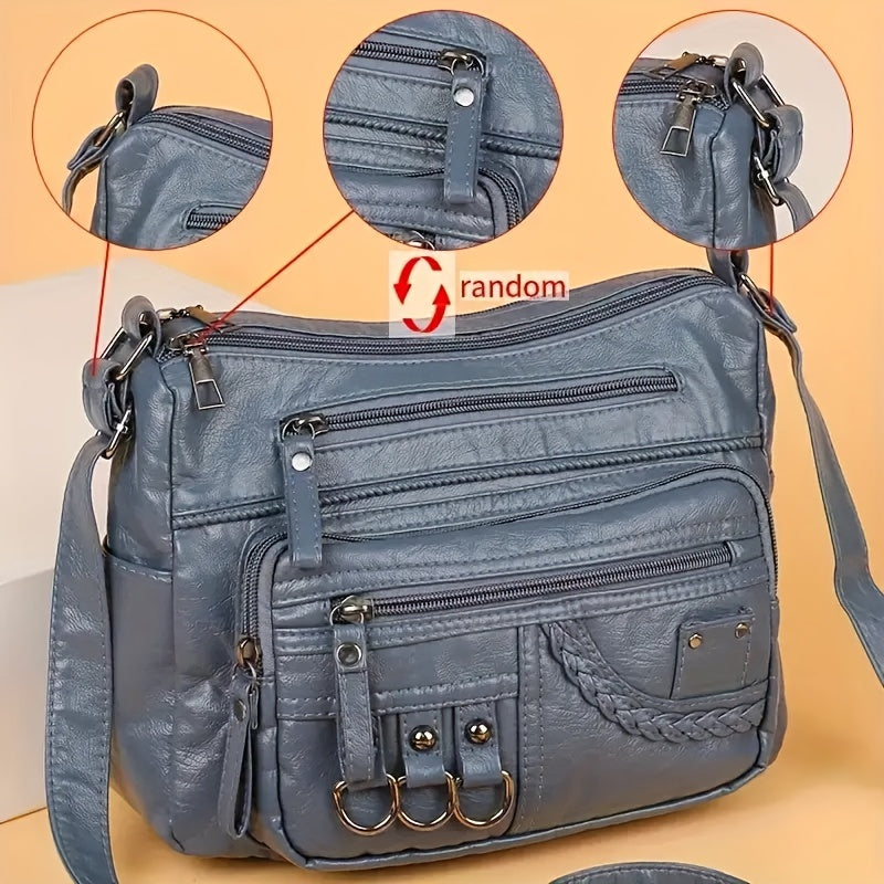 Casual black crossbody bag with multiple zippers for daily use.