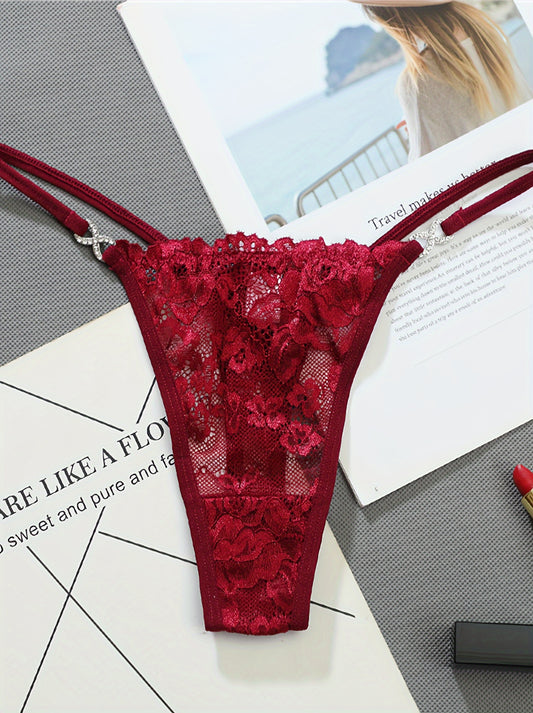 Luxurious diamond-decorated lace thong.