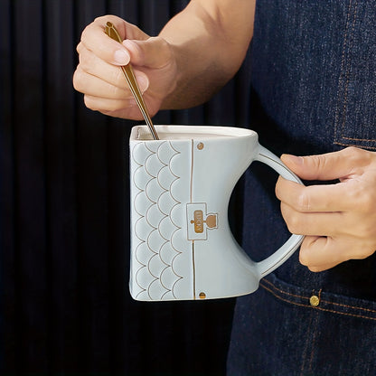 Handbag-shaped ceramic mug with spoon for coffee or tea, perfect for home or office use, with European luxury design.