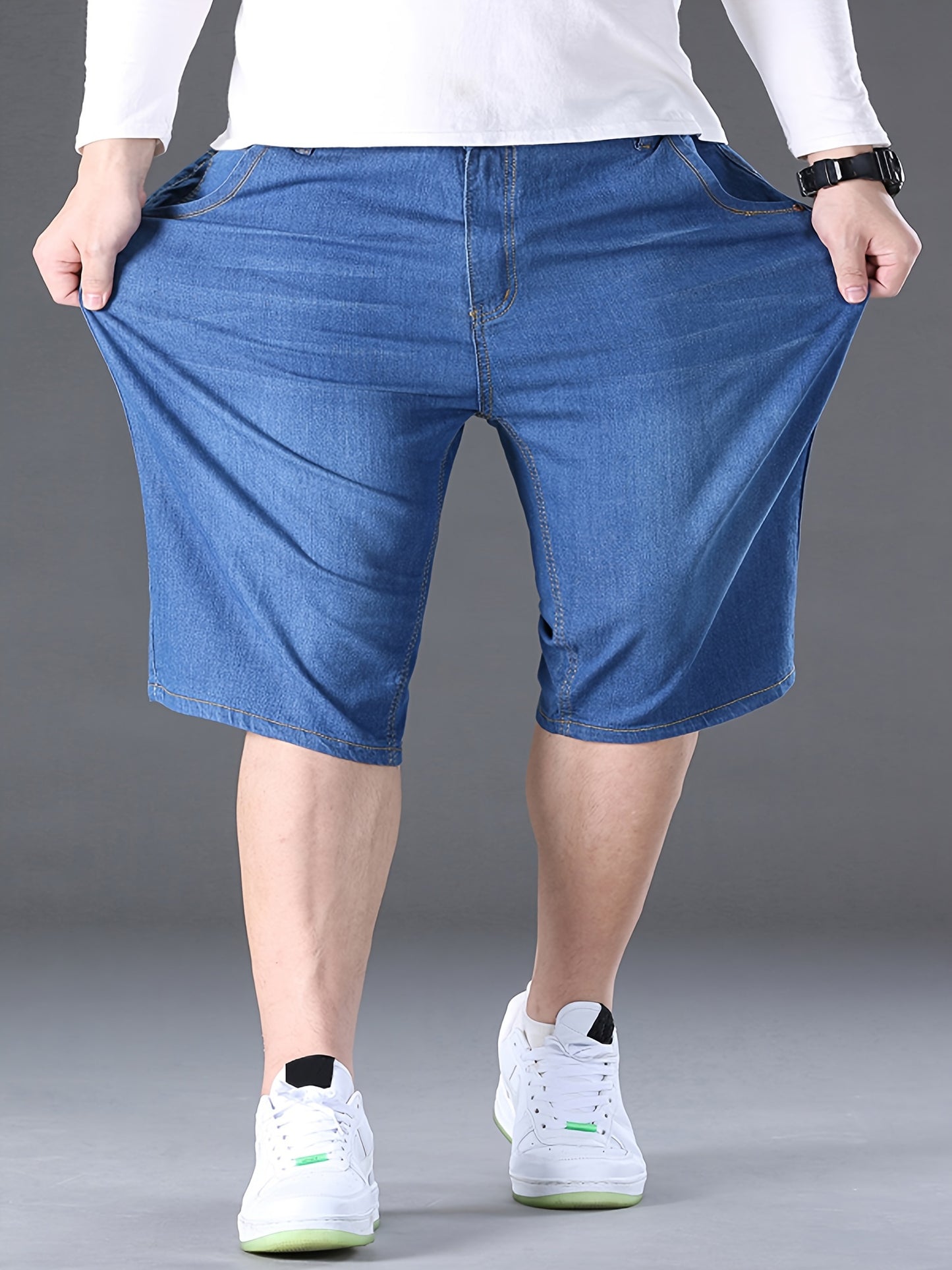 Stylish summer denim shorts for plus-size men in blue.