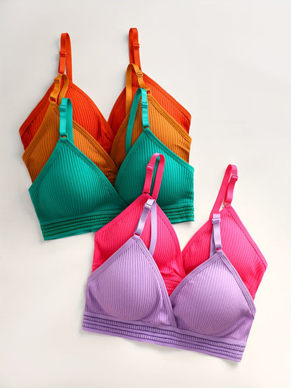 Set of 5 elegant wireless bras with ribbed texture design, soft breathable fabric, and adjustable straps for daily wear lingerie.