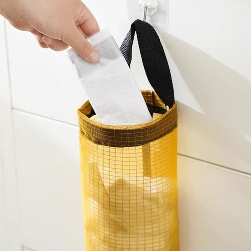 Organize and store your plastic bags with ease using our Wall-Mounted Plastic Bag Holder. This large capacity dispenser is perfect for keeping your kitchen tidy and clutter-free. Don't struggle to find a place to store your plastic bags - keep them