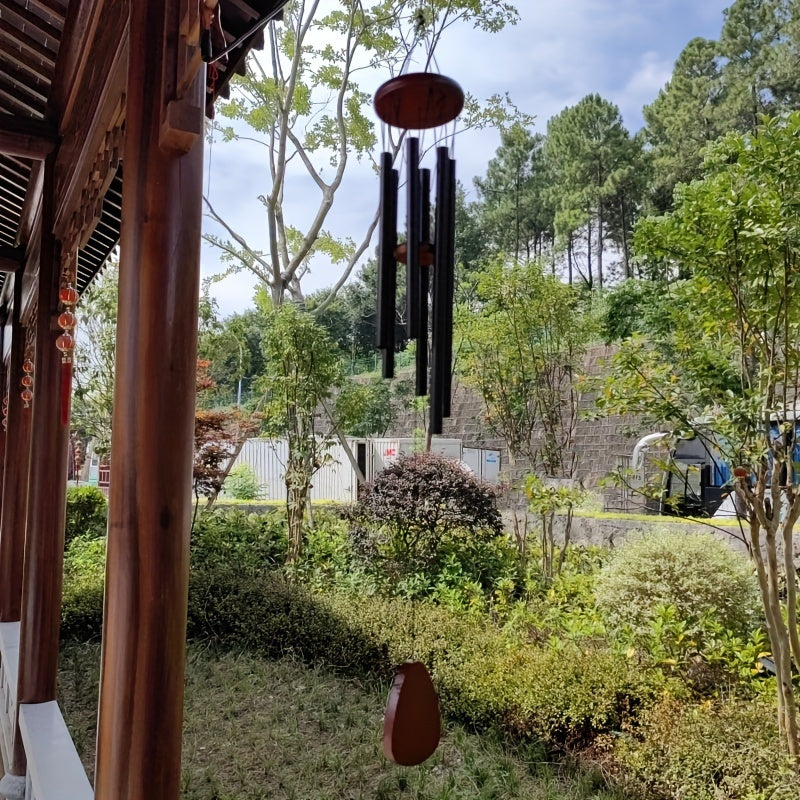 Elegant black solid wood wind chimes with aluminum tubes - perfect gift for home and garden.