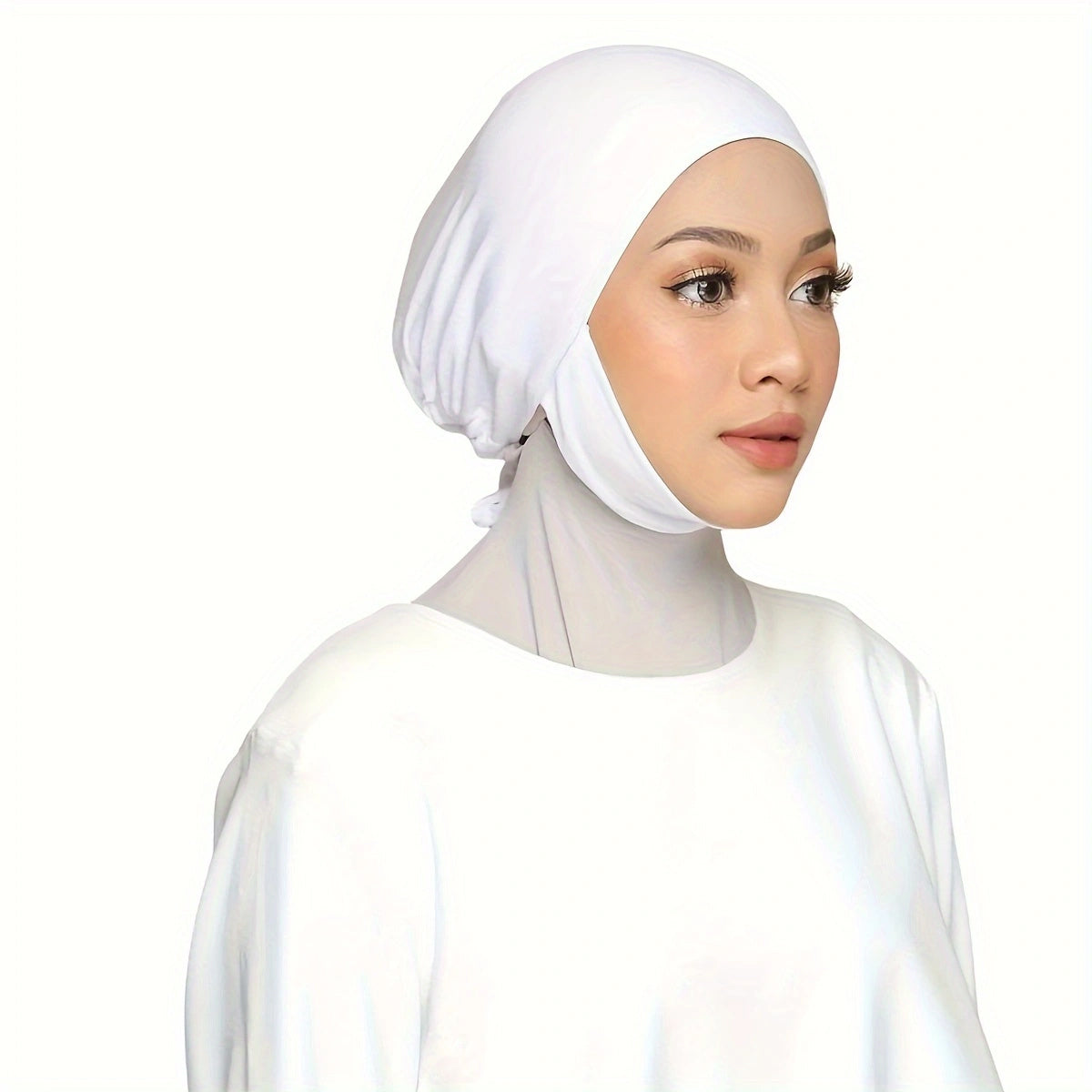 Adjustable women's instant hijab with undercap, solid color, machine washable, perfect for Eid and casual or religious wear. Made of polyester with flowing design.