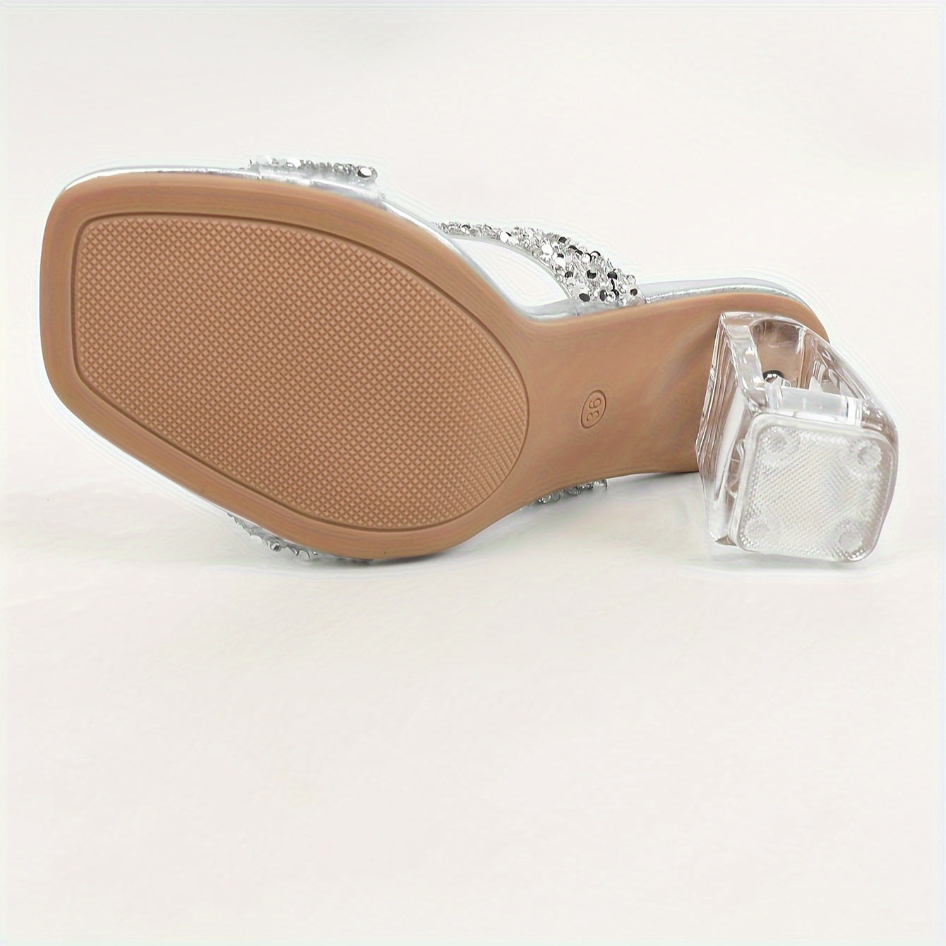 Silvery open-toe mules with crystal heels and clear chunky heels for women add charm with shiny decorations, ideal for summer parties indoors and outdoors.