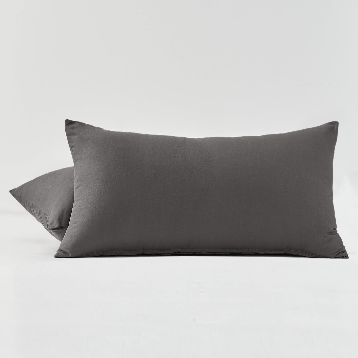 Two pillowcases made of ultra-fine microfiber solid color brushed fabric, fashioned from 100% polyester, perfect for the bedroom. Set includes 2 pillowcases.