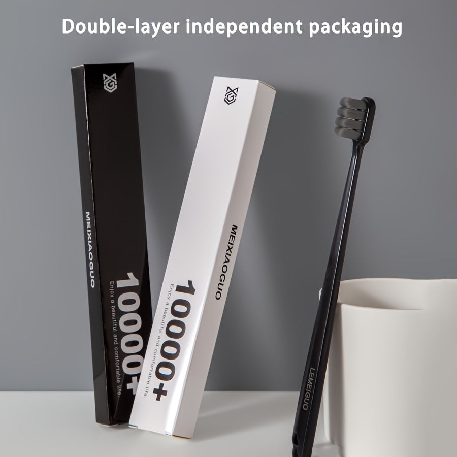 Premium manual toothbrush with soft bristles for gentle gum care. Black handle with gray/white bristles, individually wrapped for effective home oral care.