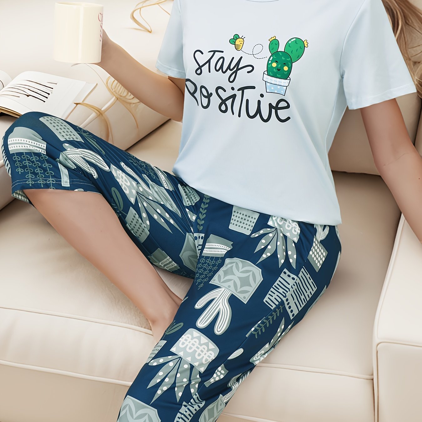 Lounge in style with women's soft tee and capri pajama set featuring slogan and cactus print.