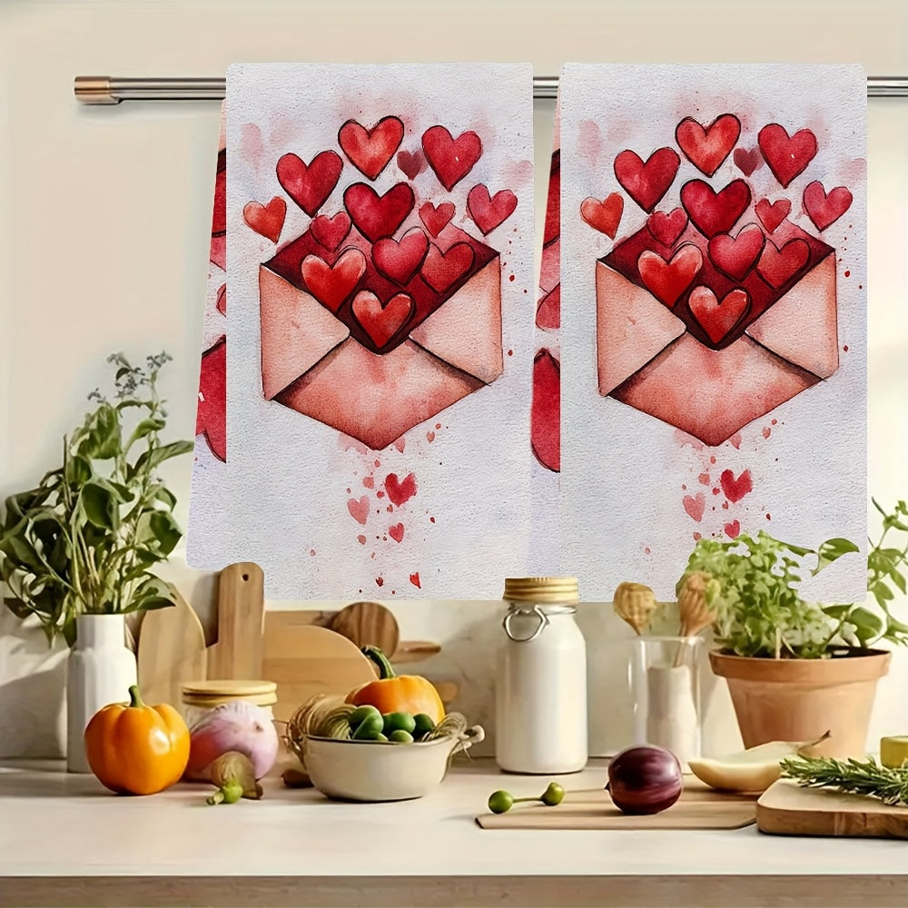 Two romantic Valentine's Day kitchen towels are available for purchase. These ultra soft and highly absorbent polyester dish hand towels measure 40.64x60.96 cm and feature a heart envelope design. They are machine washable and are ideal for holiday decor