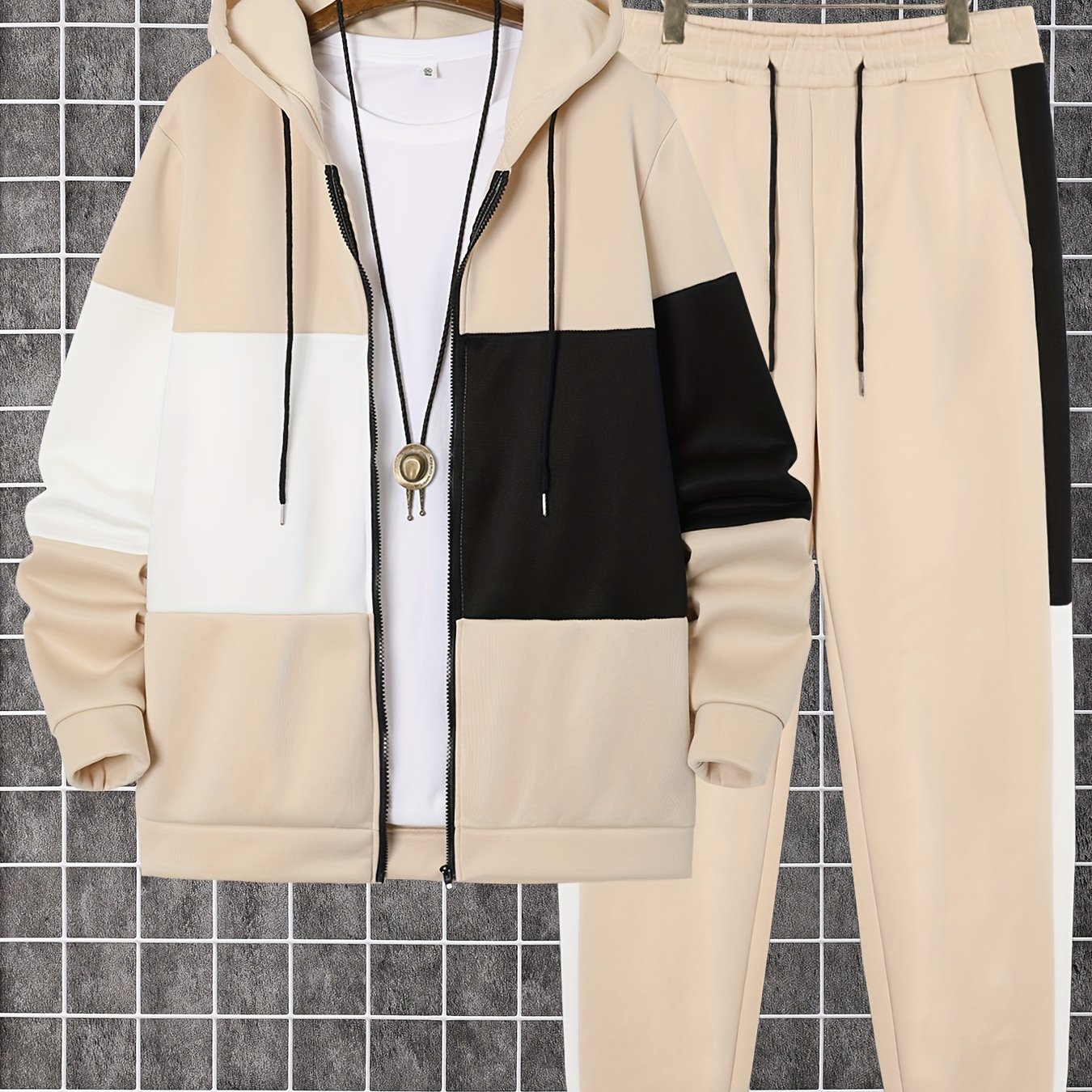 Men's 2-piece color block athletic tracksuit with long sleeve zip up hoodie, drawstring, and jogging pants for gym workouts and running.