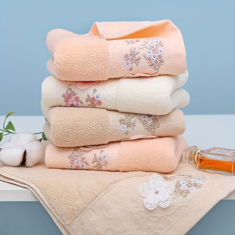 2 Cotton embroidered hand towels with quick-drying, absorbent material for home bathrooms.