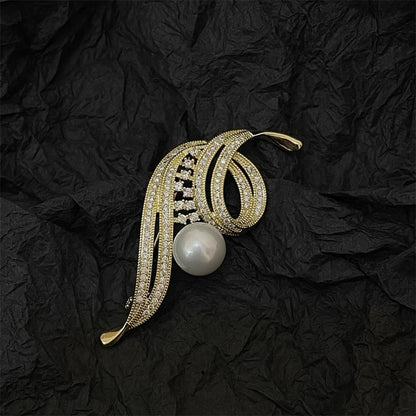 Luxurious Fashion Pin for Suit and Dress Embellishments, featuring an Elegant Alloy Brooch adorned with Sparkling Rhinestones, a Pearl Accent, and an Irregular Swirl Design.