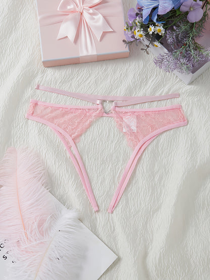 Stylish pink lace thongs for women, featuring a low-rise design with cut-out metal ring detail. Made from a breathable nylon/elastane blend for comfort during intimate moments.