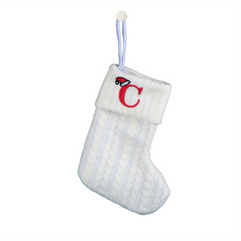 White cable knit stocking with embroidered 'F' - Ideal for indoor decor.