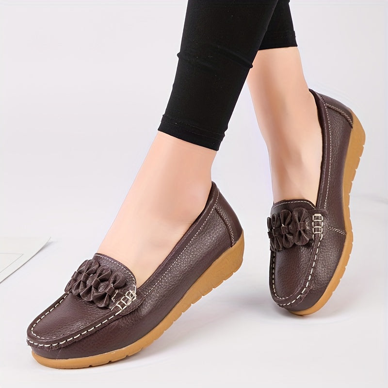 Women's flat shoes with bow detail, solid color, round toe, slip-on design for casual walking.