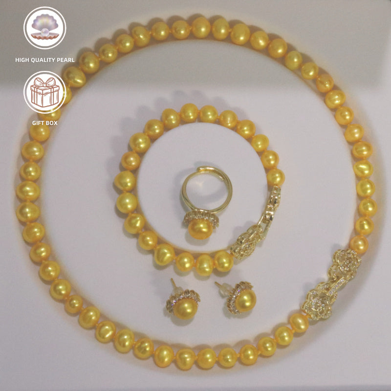 Luxurious 4-piece Jewelry Set in Beautiful Golden Tones featuring Genuine Lustrous Pearl Necklace, Bracelet, Earrings, and Ring - Exquisitely Handcrafted with High-Quality Stones for Everyday Wear or Special Occasions - Perfect for Gifting, Comes with a