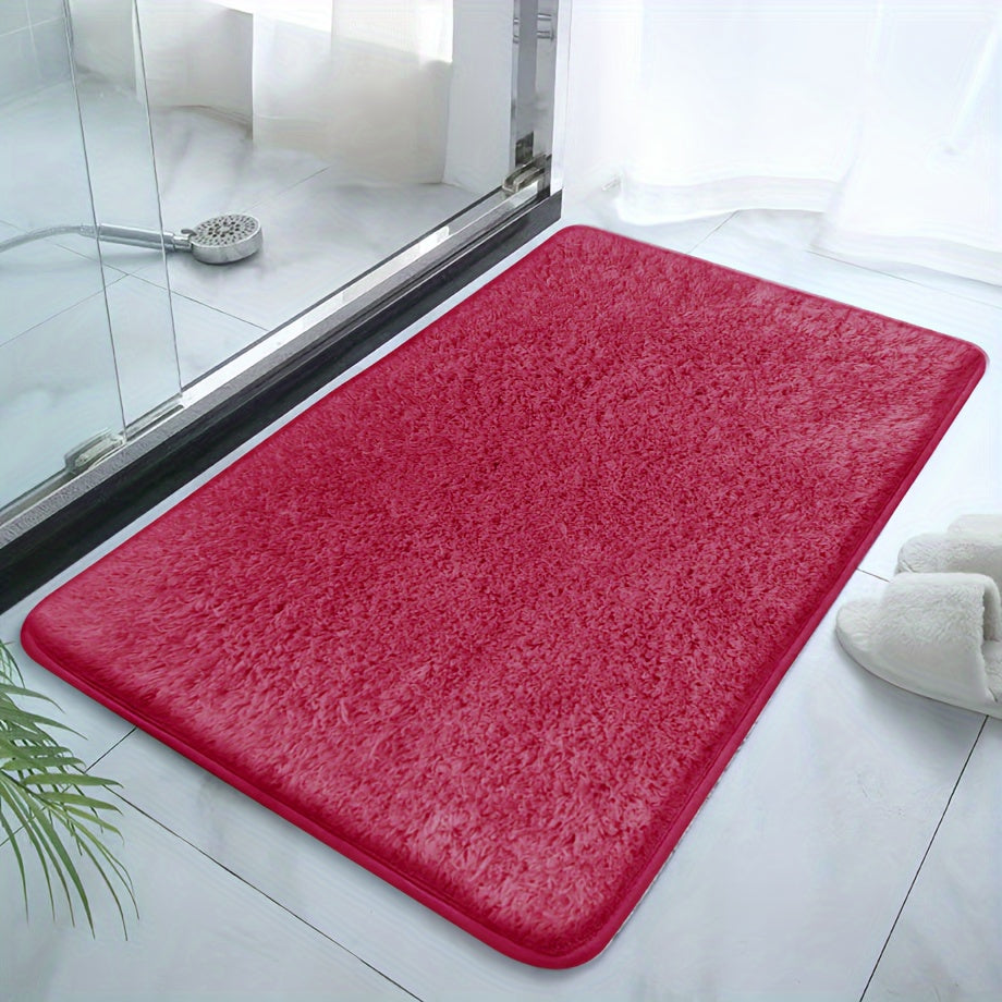 Soft and sumptuous purple bath mat offering luxury feel - highly absorbent, non-slip and fade-resistant, ideal for bathroom, bedroom and laundry room décor. Made from durable polyester, easy to clean.