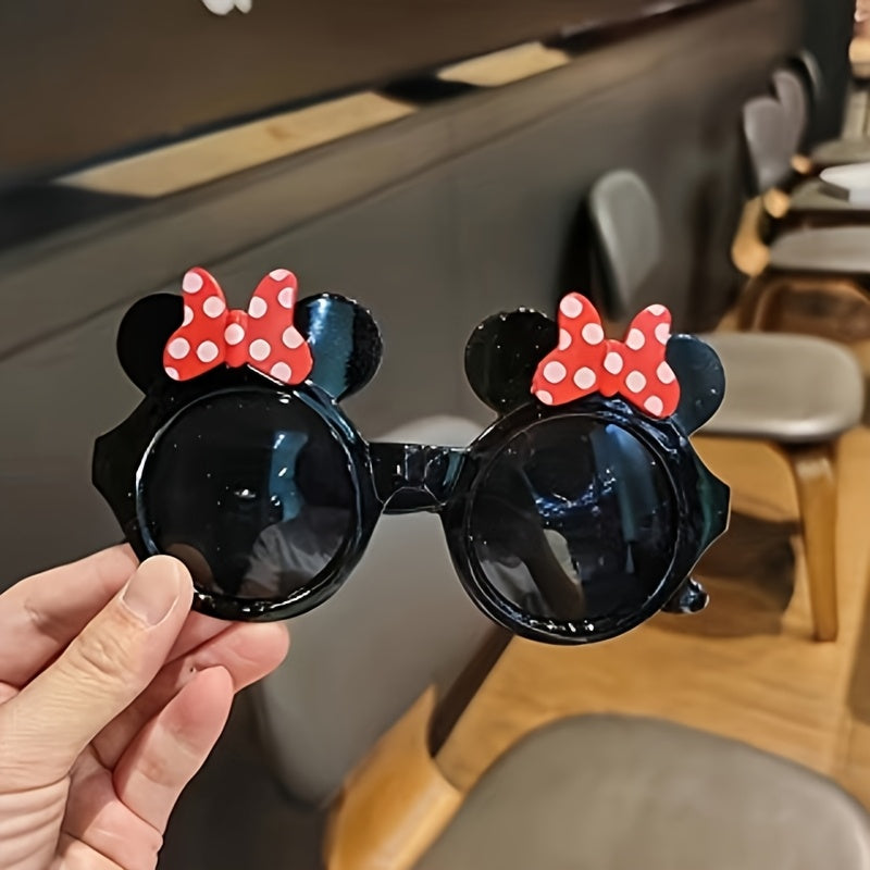 Minnie Mouse cat eye glasses in red and black with polka dot detail, perfect for women, made of plastic.