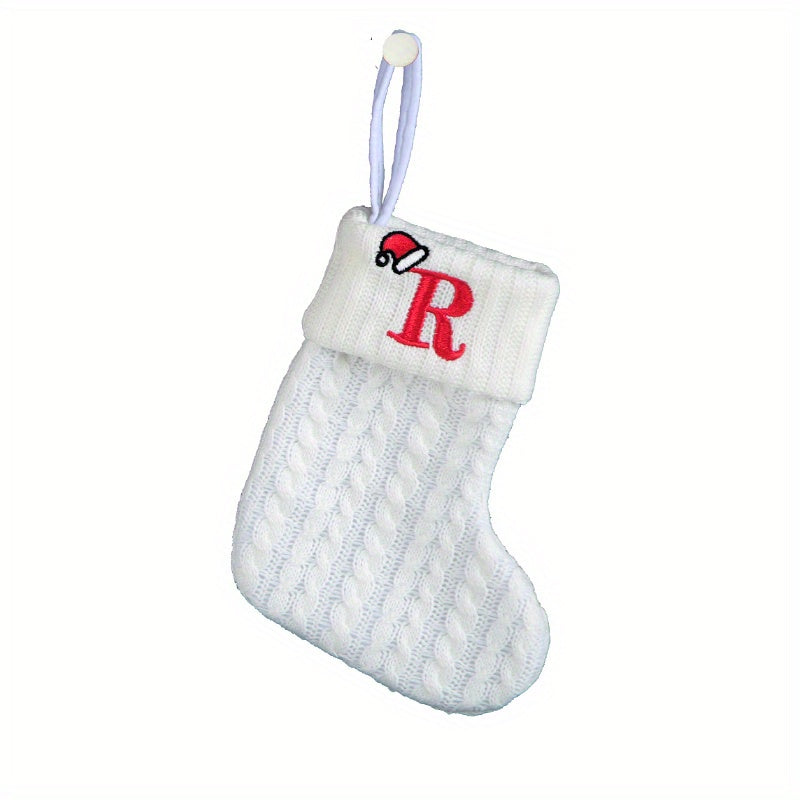 White cable knit stocking with embroidered 'F' - Ideal for indoor decor.