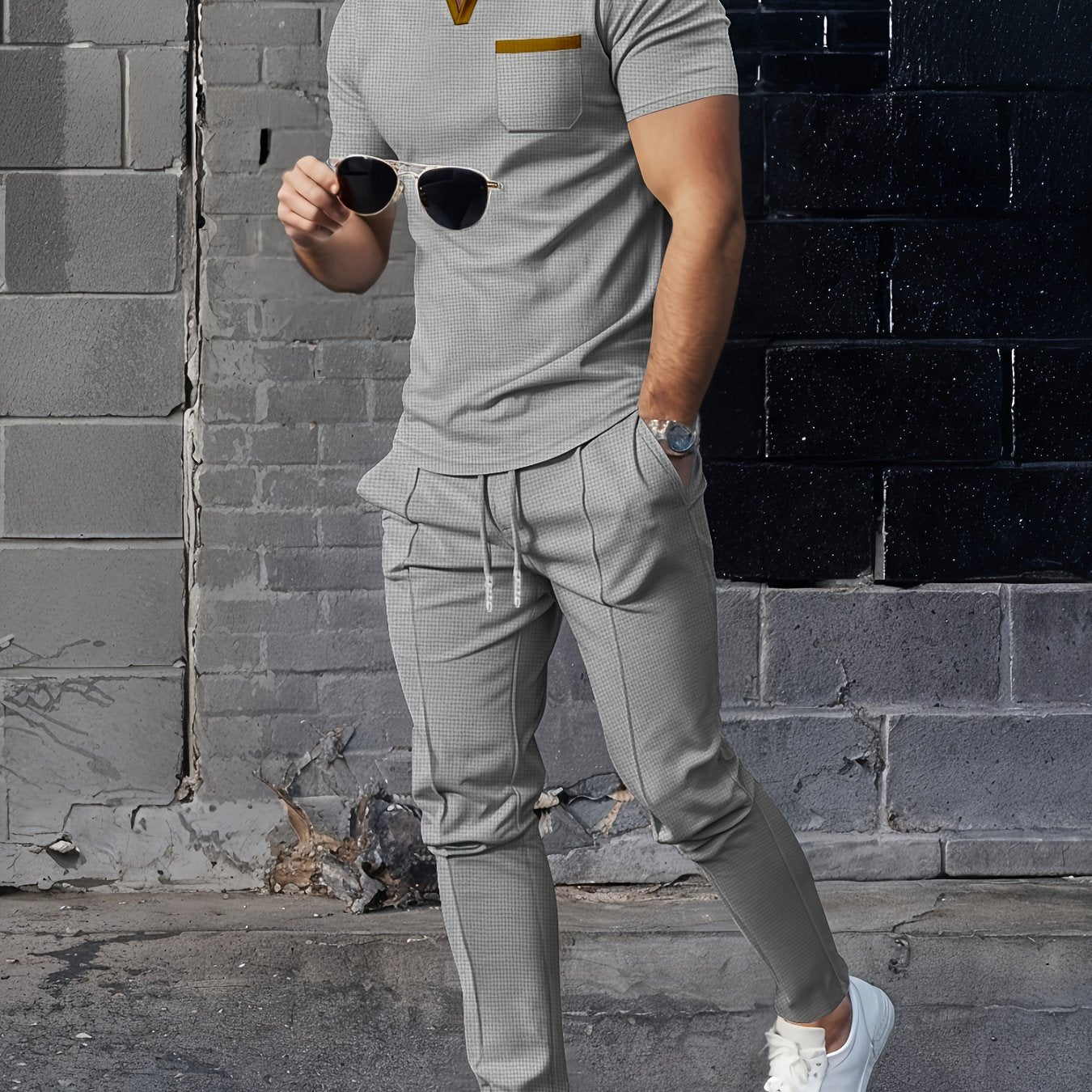 High end trendy men's casual set with waffle collar short sleeve top and long pants in a solid color