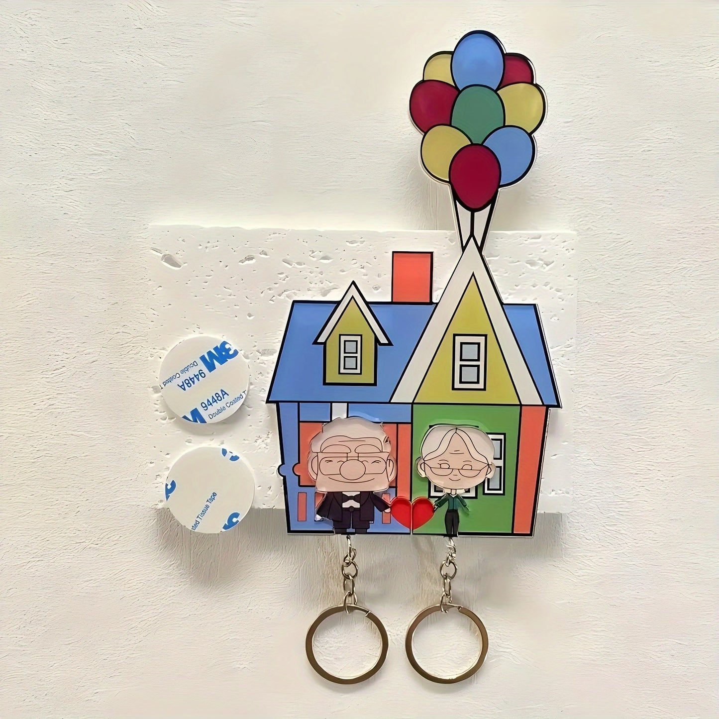 A romantic couple keychain set featuring acrylic keyrings with a self-adhesive back and heart pendant. This perfect gift for newlyweds and lovers is a Christmas novelty accessory for women, themed around friendship and love. The keychains are rectangular