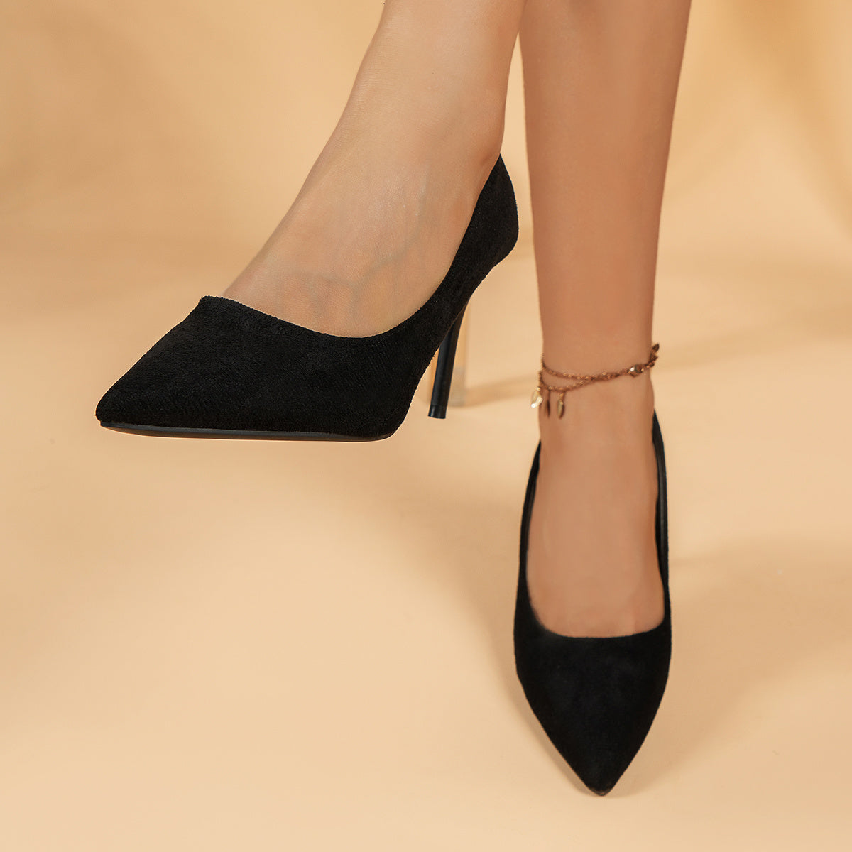 Black slip on stiletto court pumps with pointed toe and versatile style.