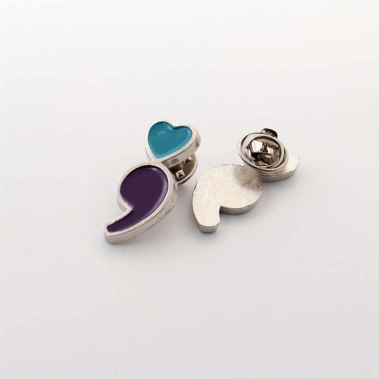 Lapel pin promoting mental health awareness and suicide prevention, available in packs of 6 or 12.