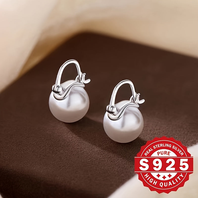 Elegantly crafted from S925 sterling silver, these stunning ladies' earrings feature arched shell pearls that exude exquisite charm. Perfect for wearing at banquets and weddings, this pair makes a great gift option as it is low in allergens and