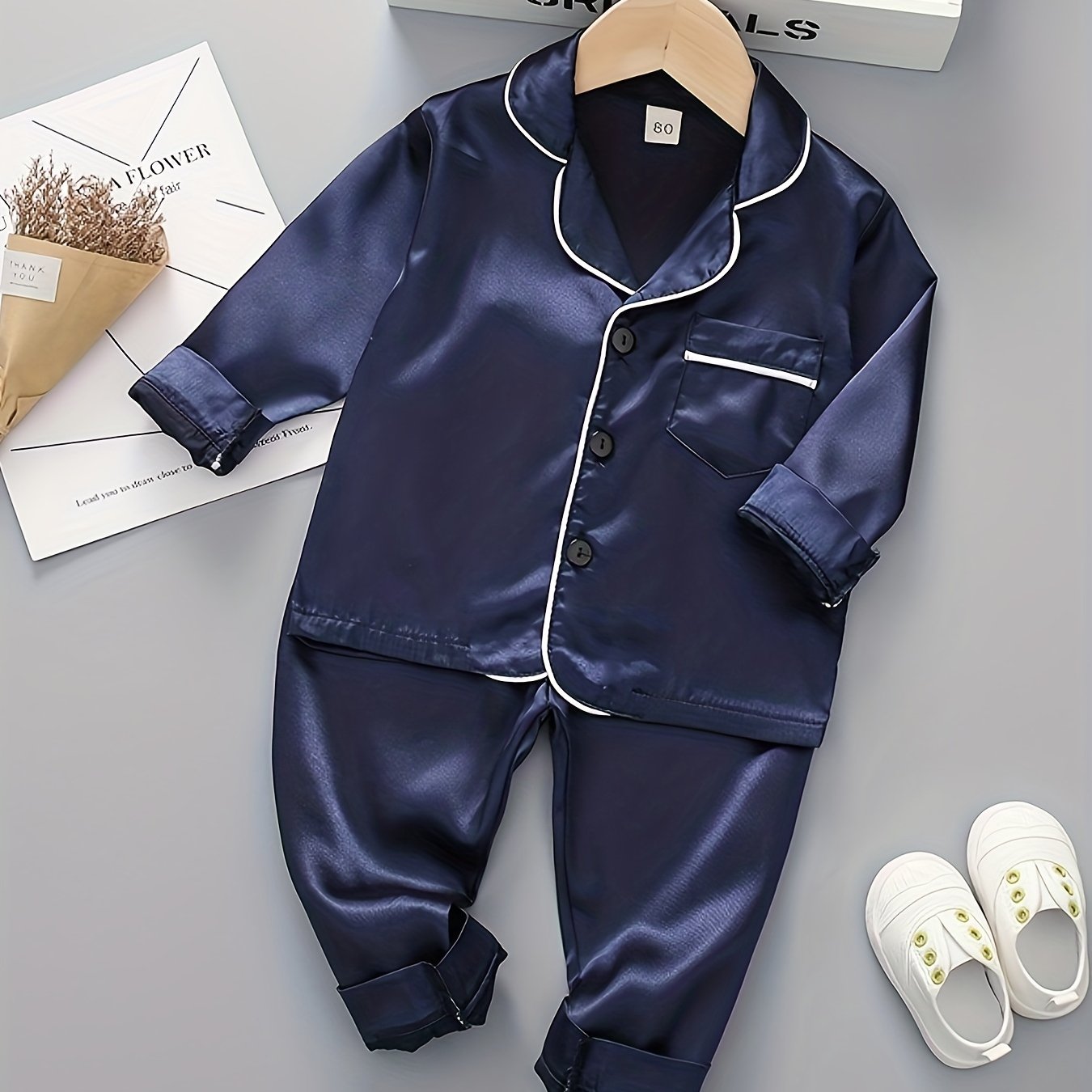 Boys' classic long sleeve pajama set made with polyester, featuring a lapel collar, button front, and regular fit for spring/fall.