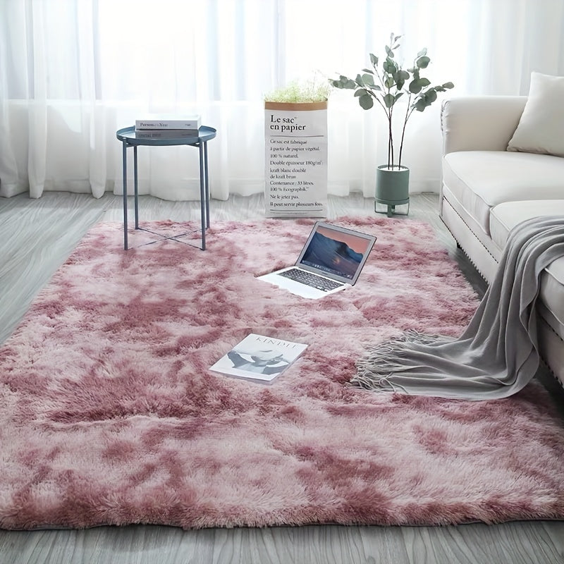 Soft, fluffy shag area rug perfect for living rooms and bedrooms. This shaggy floor carpet adds a touch of luxury and comfort to your home decor. Non-slip, machine washable for easy maintenance. Add a cute and cozy touch to any room with this stylish rug.