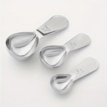 Coffee scoop made of stainless steel with measurement marks - ideal for measuring beans, powder, and baking ingredients.