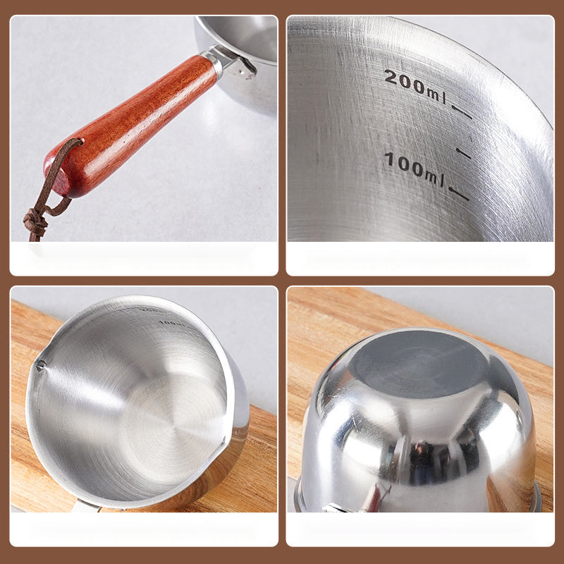 Small saucepan made of stainless steel with a wooden handle, perfect for pouring hot oil or serving soup and sauce, featuring a measuring spout for accuracy.