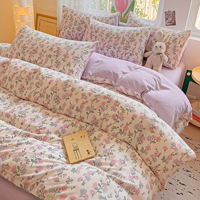 Soft floral print bedding set includes duvet cover and 2 pillowcases, made of breathable polyester with zip closure. Suitable for all seasons, perfect for bedrooms and guest rooms.