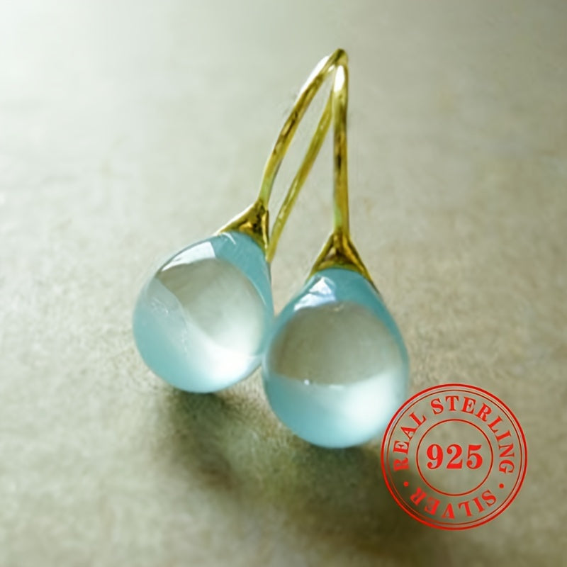 These elegant earrings for women are a stunning addition to any outfit. Crafted from high-quality S925 sterling silver and featuring faux sea blue gemstone pendants, these stylish dangly earrings weigh 3.3 grams. Perfect for weddings and other special