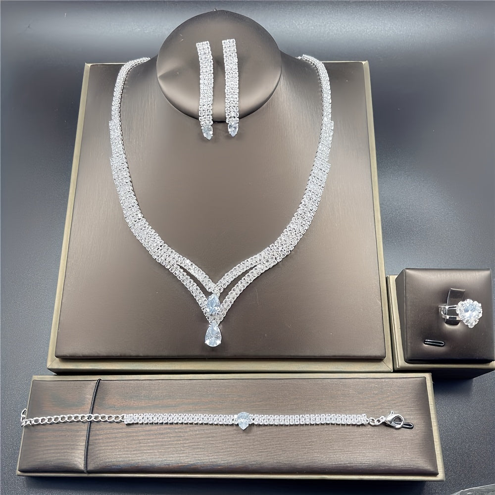 Sophisticated 4-piece Bohemian Jewelry Set featuring Shimmering Rhinestone Teardrop Pendants - Ideal for Weddings & Parties. Set includes Necklace, Earrings, Bracelet, and Ring.