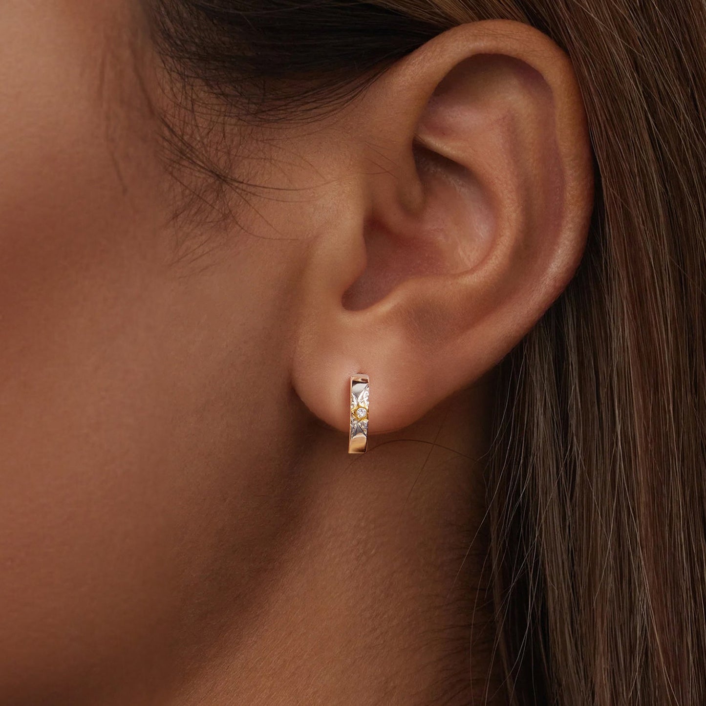 Get ready to shine at music festivals and parties with these stunning earrings! Made of elegant 925 sterling silver, these hoops feature a star accent with synthetic zirconia. They are hypoallergenic, lightweight at 3.2g, and perfect for all-season wear.