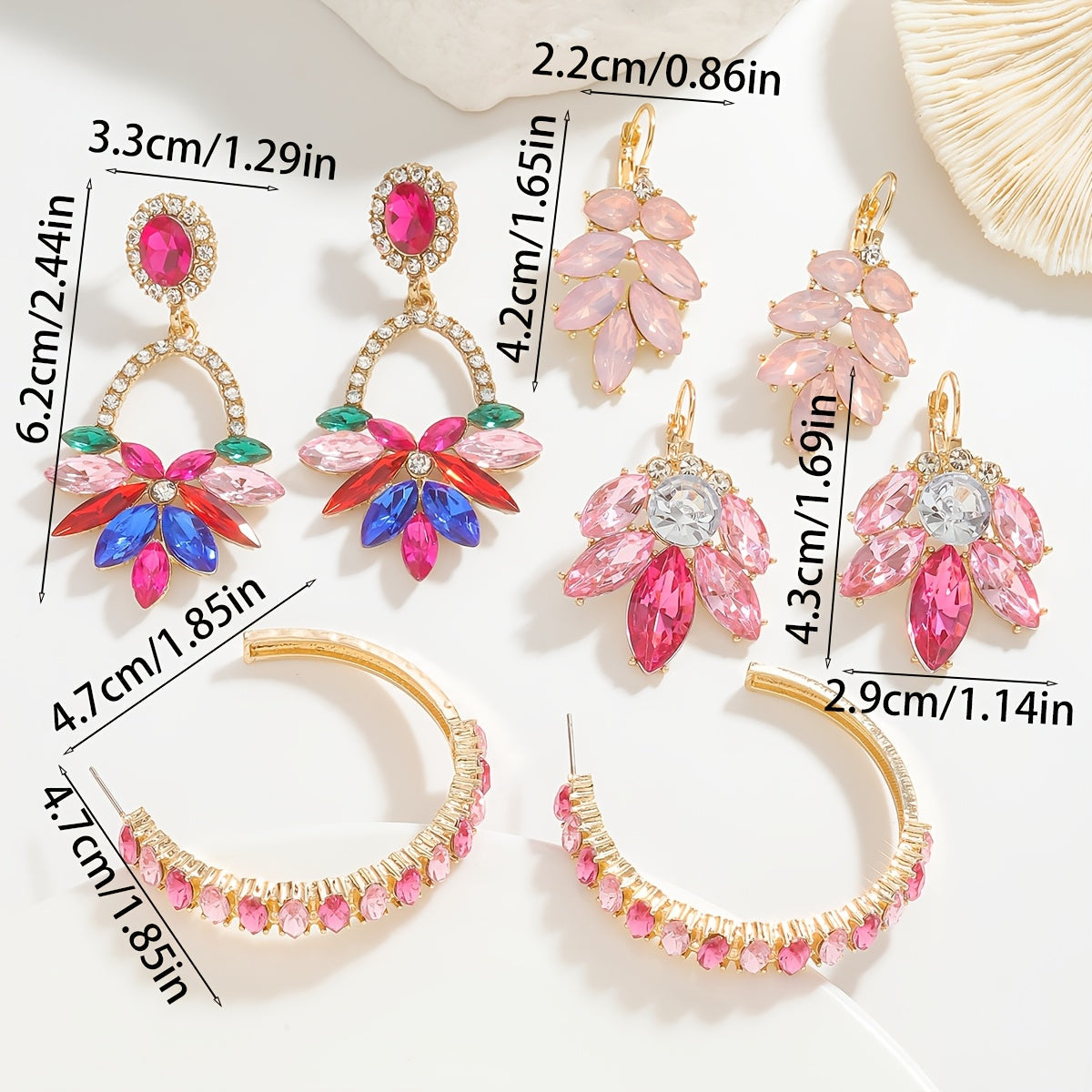 Shimmering pink floral and leaf earrings adorned with rhinestones - chic fashion accessory, made of gold-tone zinc alloy with stainless steel posts, perfect Valentine's Day gift for your girlfriend, suitable for all occasions and seasons.