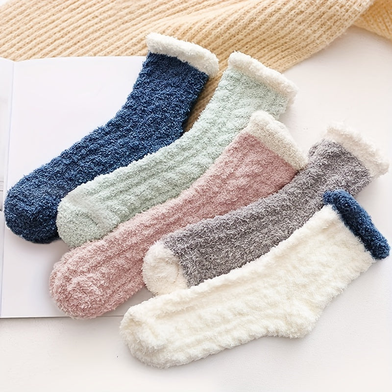 5 pairs of cozy, colorful mid-calf slipper socks for women in blue, green, pink, gray, and white.