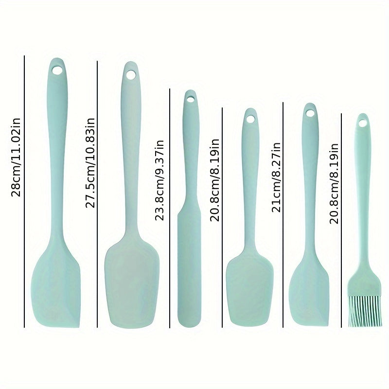 Set of 5-6 silicone spatulas, perfect for scraping cake cream and applying oil while baking. These tools are food-grade and also include a brush, making them essential kitchen gadgets and accessories.