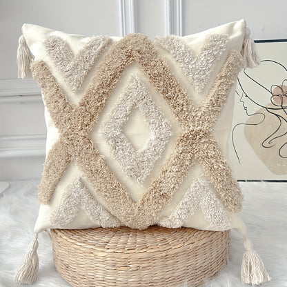 Bohemian-style throw pillow cover in beige and khaki with tassels, textured canvas, geometric patterns, tribal embroidery. Perfect for farmhouse decor on couch, sofa, bedroom, living room.