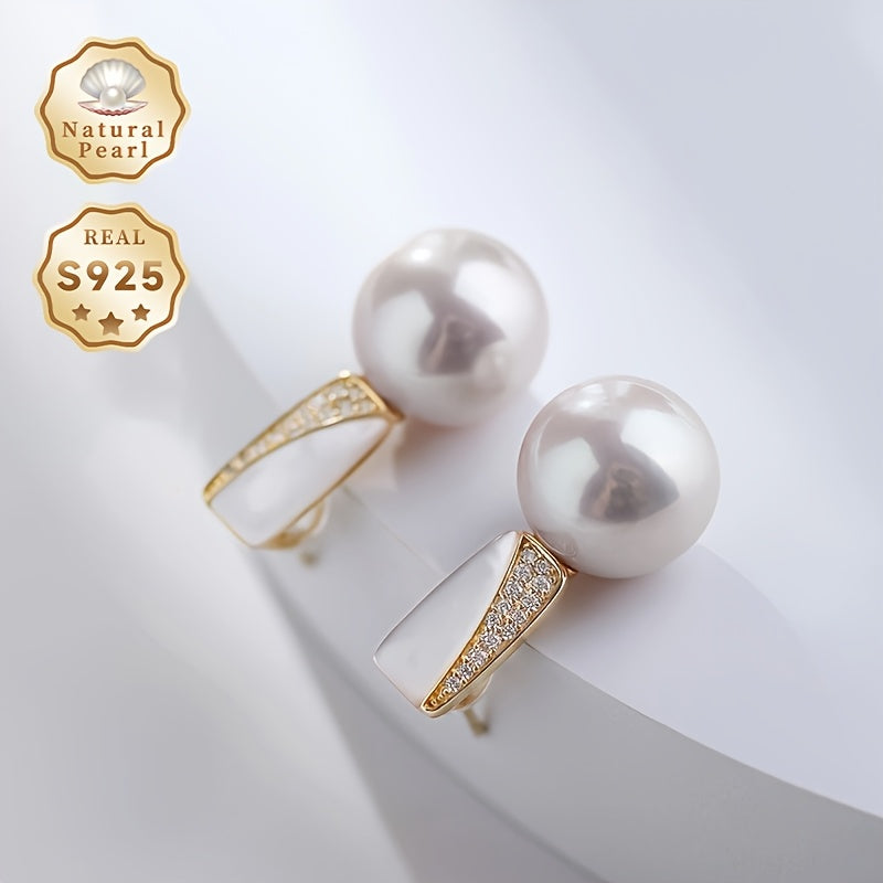 Surprise someone special with this must-have gift box containing a pair of fashionable dangling earrings for women. Made with S925 silver and featuring lustrous 11-12mm round natural freshwater pearls, each pair is unique as the natural pearls come in