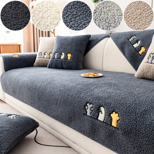 Modern plush sofa cover with paw pattern embroidery, non-slip protection for sofas, machine washable and suitable for various types of furniture.