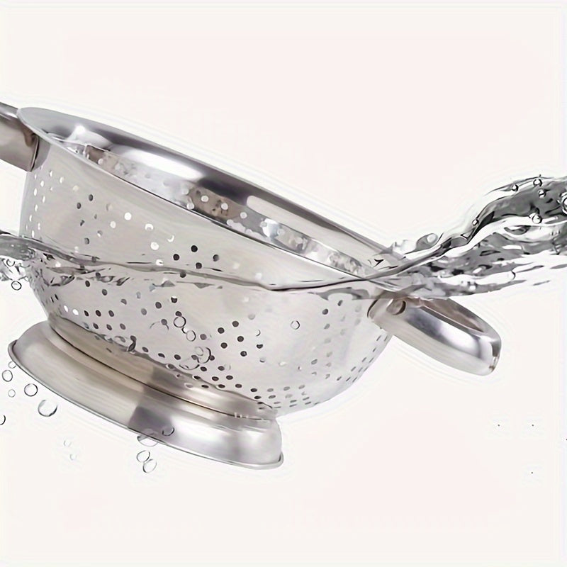 One piece of a durable metal colander with handles, perfect for washing and draining vegetables, fruits, and pasta. This food-safe kitchen strainer is made of stainless steel and comes with a sturdy base.