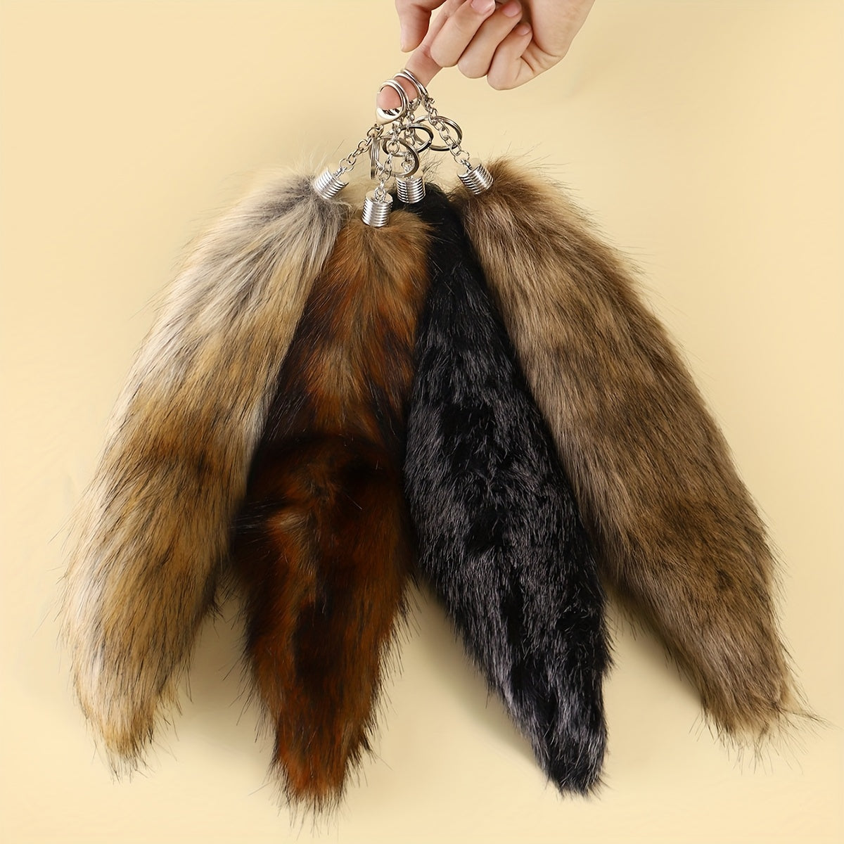 Large Faux Fox Tail Keychain for Women, made with Flannelette Fur and designed as a Carry Bag Keyring. This Novelty Fashion Accessory features a Lobster Claw Closure and is a Decorative Keyring perfect for Birthday Gifts.