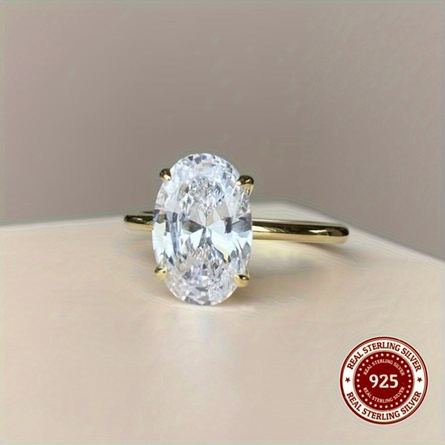 Simple and elegant 14K gold plated S925 silver ring featuring an oval cut synthetic cubic zirconia in 1CT, 2CT, or 3CT. Perfect for daily wear or as a thoughtful gift.