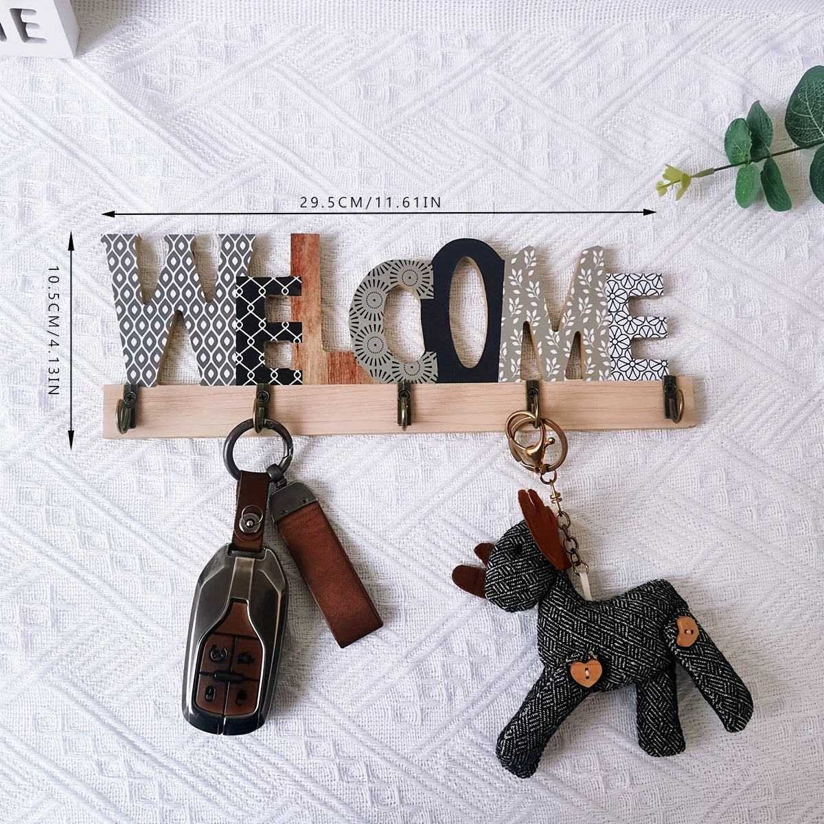 Stylish letter design key holder for wall, door, and hat bag - great housewarming or realtor gift.