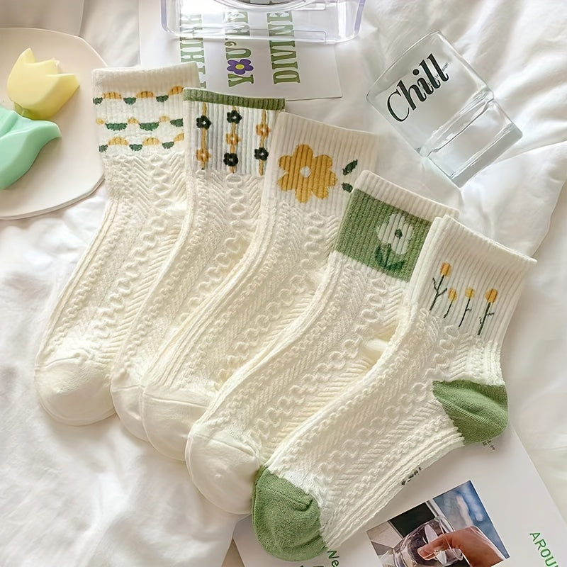 Five pairs of mid-calf socks for women with floral patterns.