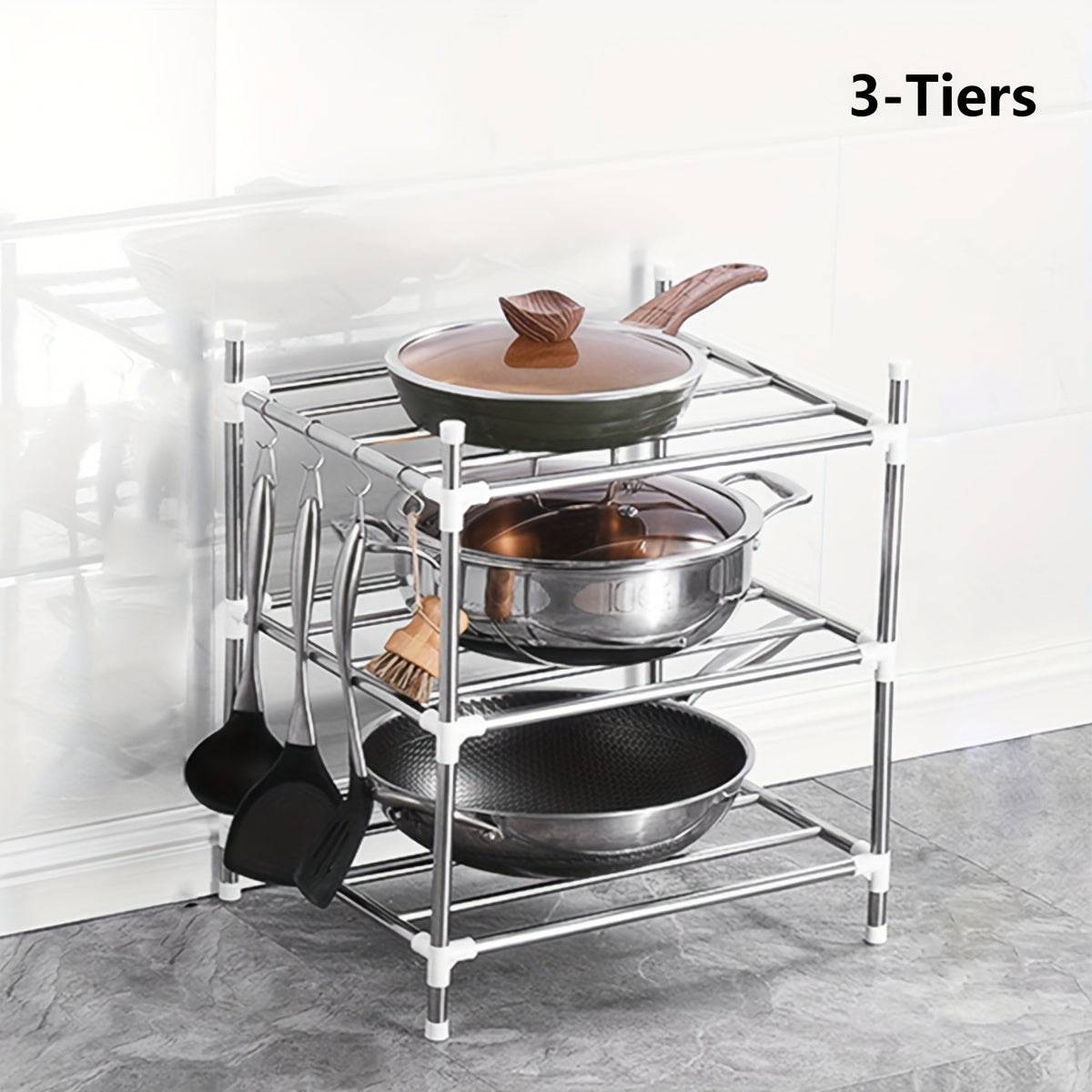 Multi-tier stainless steel storage shelf, ideal for organizing kitchen, bathroom, balcony, and rest room. Perfect for storing cookware, tableware, oven, microwave oven, and basin.