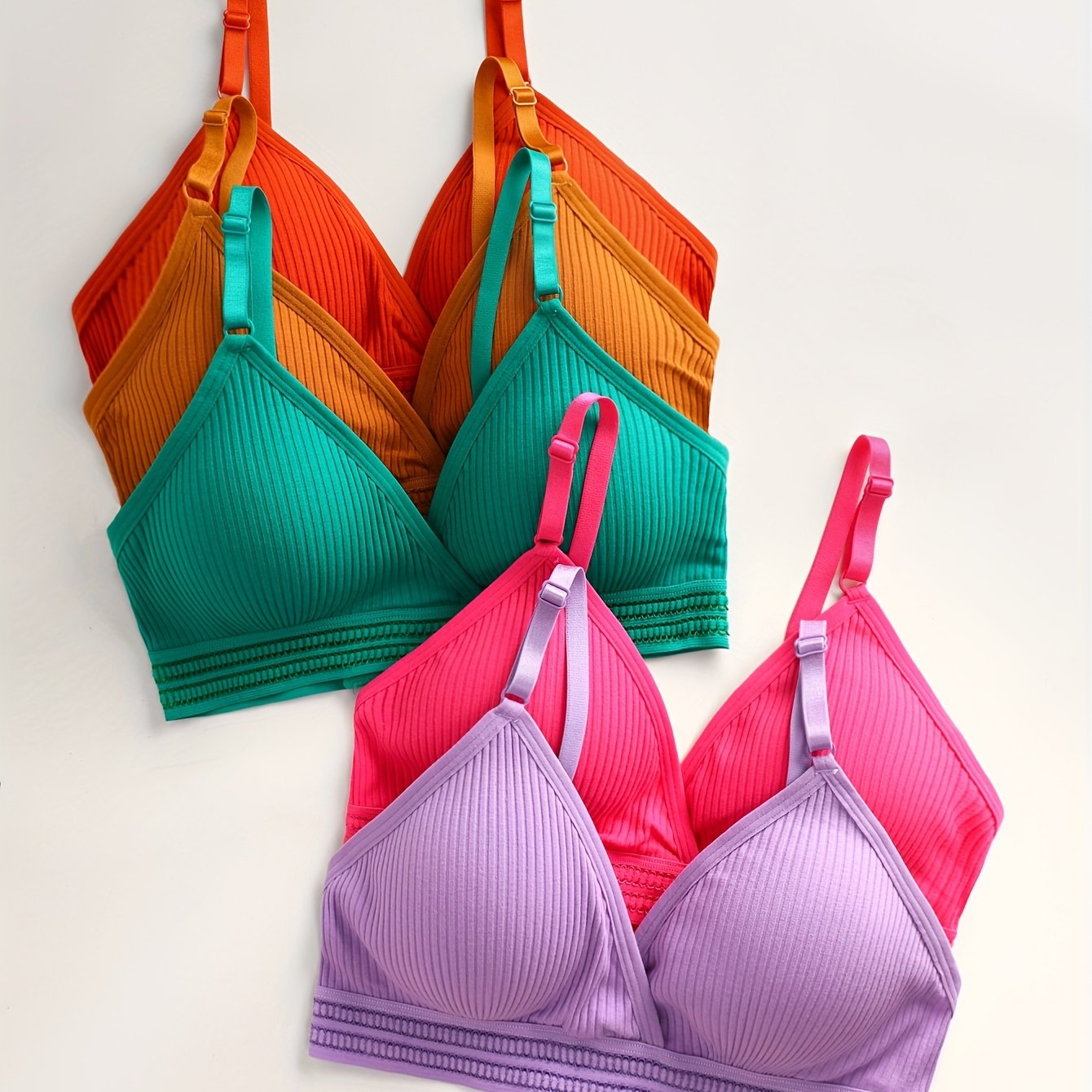 Set of 5 elegant wireless bras with ribbed texture design, soft breathable fabric, and adjustable straps for daily wear lingerie.